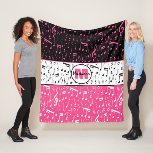 Black pink and white music notes fleece blanket