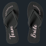 Black Pink Name Bride Bridal Party Bachelorette Flip Flops<br><div class="desc">A simple black and pink minimalist typography design for a bridal shower, bachelorette party or beach wedding. The text is customizable and can be personalized with your own name and bride slogan. For example, Bride Squad instead of Team Bride, Bride repeated on the left and right foot, or something else....</div>