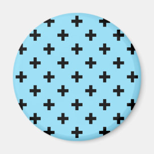 Black polka crosses on baby blue magnet