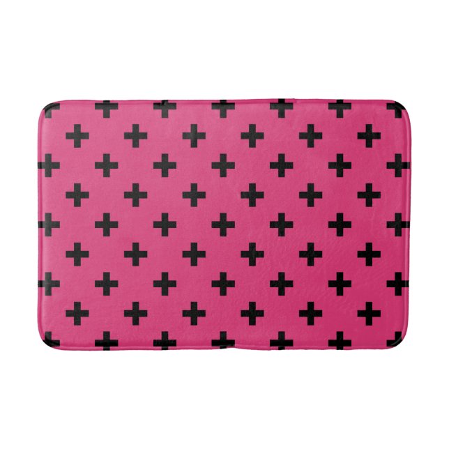 Black polka crosses on fuchsia bath mat (Front)