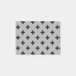 Black polka crosses on grey post-it notes