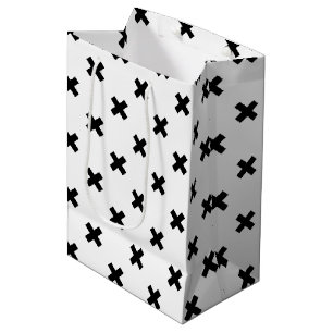 Black polka crosses on white medium gift bag
