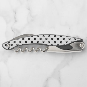 Black polka crosses on white waiter's corkscrew