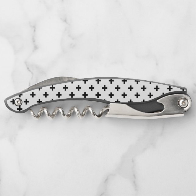 Black polka crosses on white waiter's corkscrew (Back)