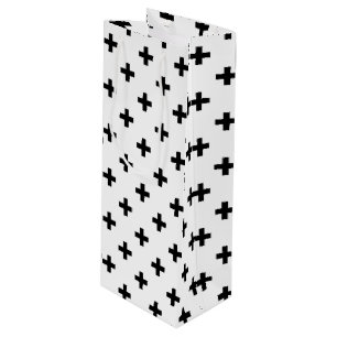 Black polka crosses on white wine gift bag