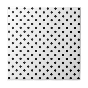 Black polka dots medium on white ceramic tile