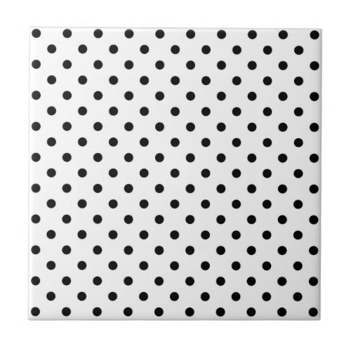 Black polka dots medium on white ceramic tile