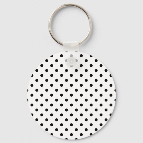 Black polka dots medium on white keychain