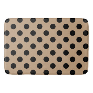 Black polka dots on beige bathroom mat