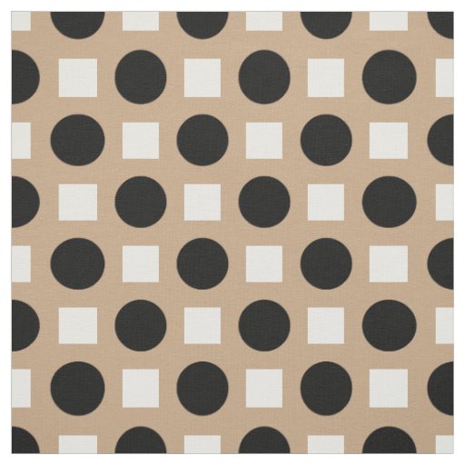 Black polka dots on beige fabric