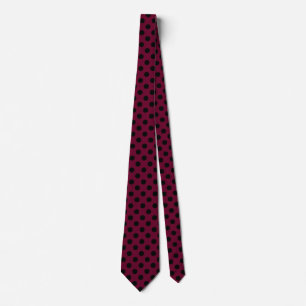 Black polka dots on burgundy neck tie