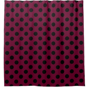 Black polka dots on burgundy shower curtain