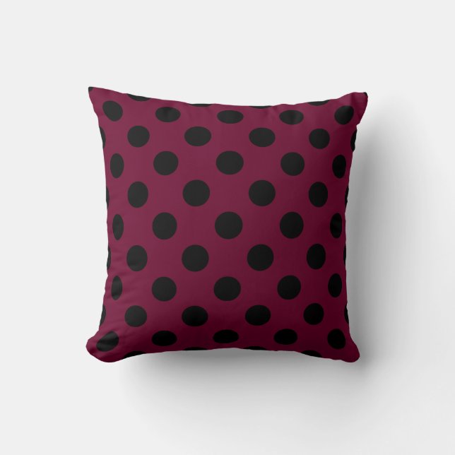 Black polka dots on burgundy throw pillow (Front)
