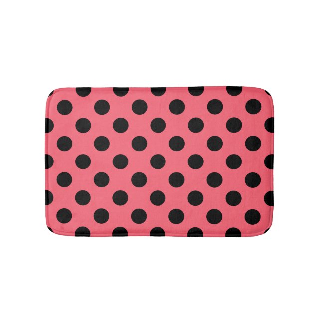 Black polka dots on coral bath mat (Front)