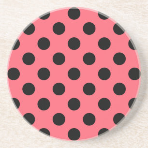 Black polka dots on coral coaster