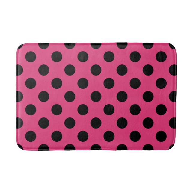 Black polka dots on fuchsia bath mat (Front)