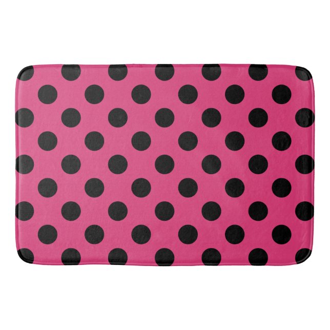 Black polka dots on fuchsia bathroom mat (Front)