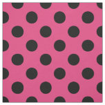 Black polka dots on fuchsia fabric