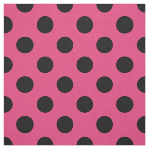 Black polka dots on fuchsia fabric