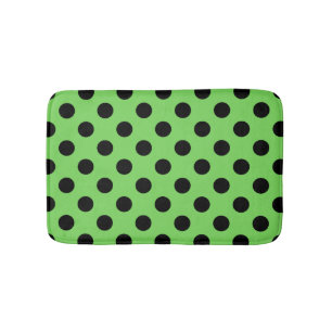 Black polka dots on lime green bathroom mat