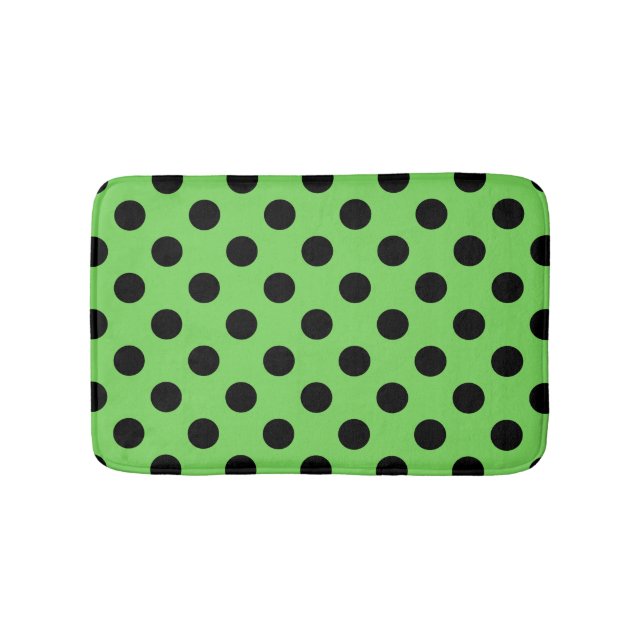 Black polka dots on lime green bathroom mat (Front)