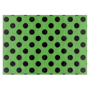 Black polka dots on lime green cutting board