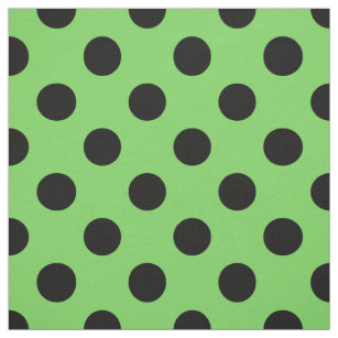 Black polka dots on lime green fabric