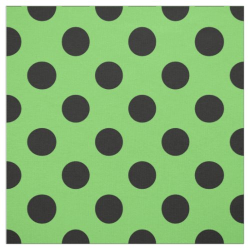 Black polka dots on lime green fabric