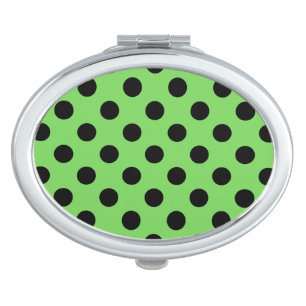 Black polka dots on lime green makeup mirror