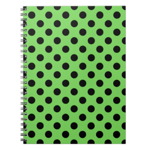 Black polka dots on lime green notebook