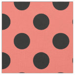 Black polka dots on living coral fabric