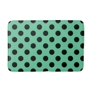 Black polka dots on mint green bathroom mat