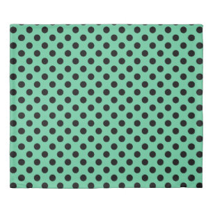 Black polka dots on mint green duvet cover