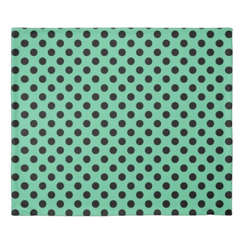 Black polka dots on mint green duvet cover