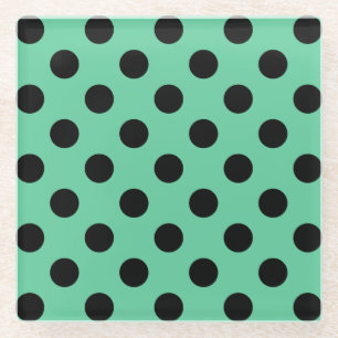 Black polka dots on mint green glass coaster