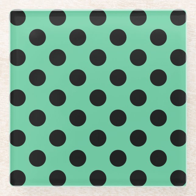 Black polka dots on mint green glass coaster (Front)