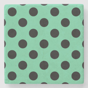 Black polka dots on mint green stone coaster