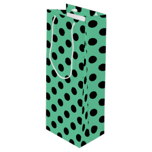 Black polka dots on mint green wine gift bag