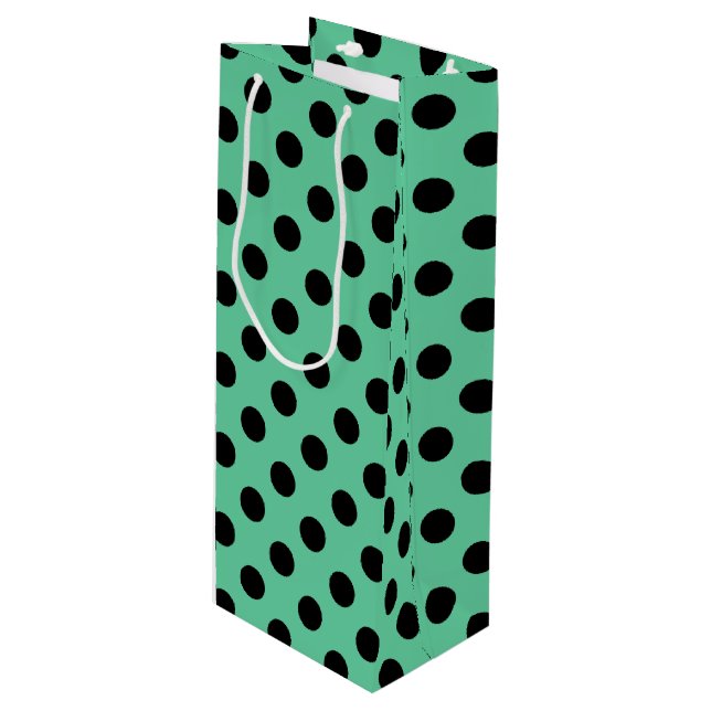 Black polka dots on mint green wine gift bag (Front Angled)
