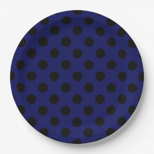 Black polka dots on navy blue paper plates