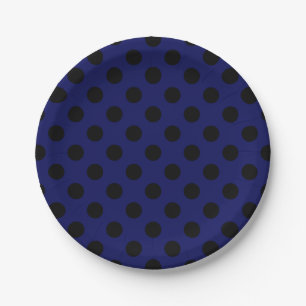 Black polka dots on navy blue paper plates