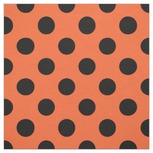 orange and black polka dot fabric