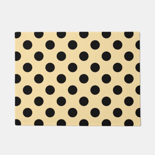 Black polka dots on pale yellow doormat