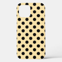 Black polka dots on pale yellow