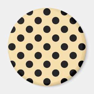 Black polka dots on pale yellow magnet