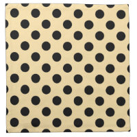 Black polka dots on pale yellow