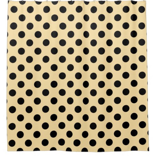 Black polka dots on pale yellow shower curtain