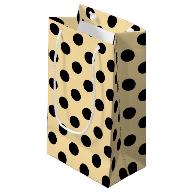 Black polka dots on pale yellow small gift bag (Front Angled)