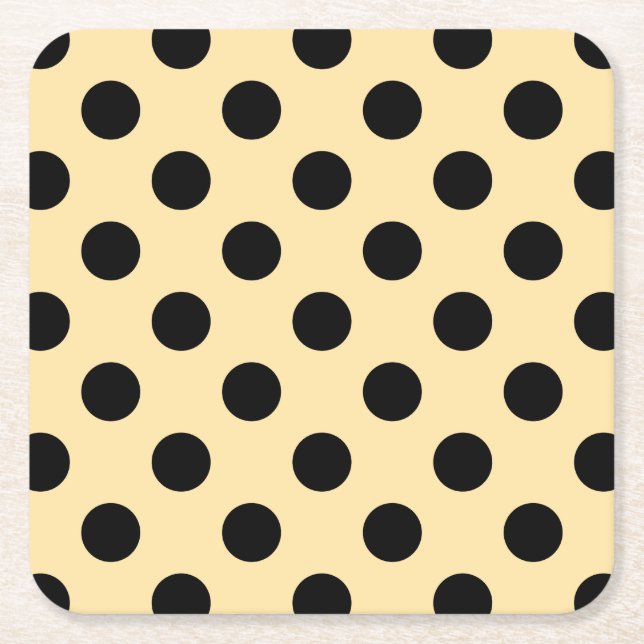 Black polka dots on pale yellow square paper coaster (Front)