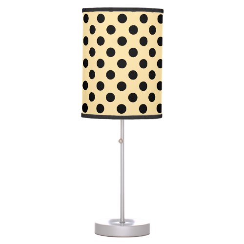 Black polka dots on pale yellow table lamp